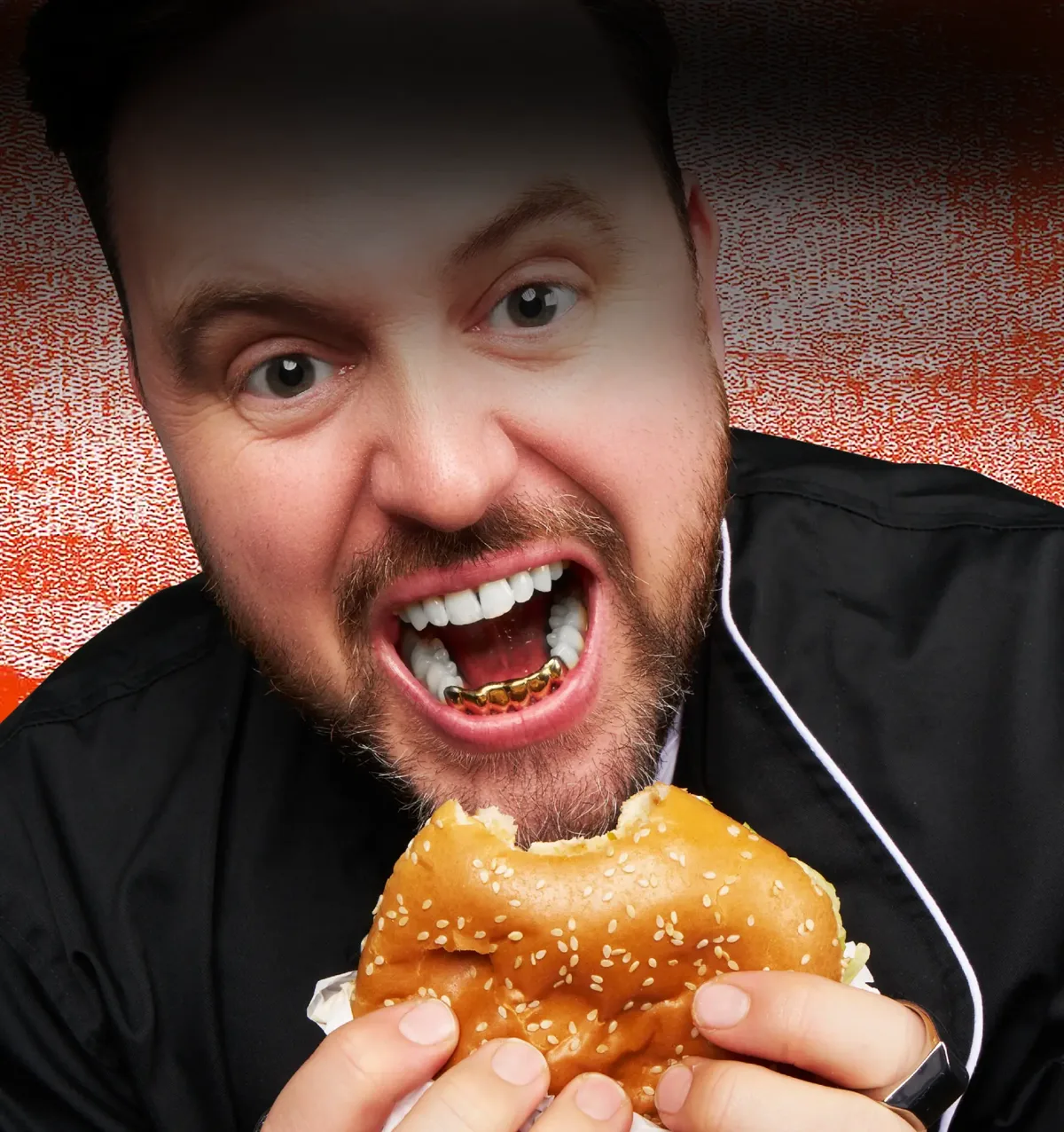 Nick Hamman biting into a burger