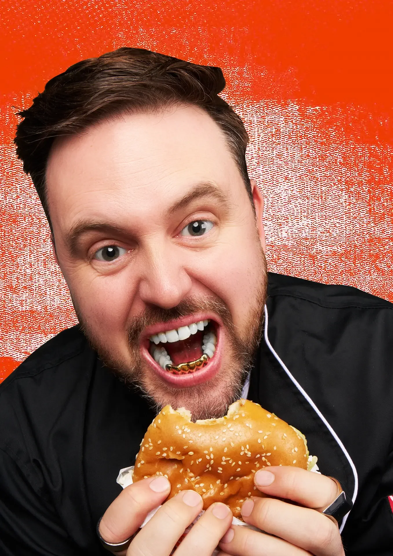 Nick Hamman biting into a burger